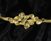 Bracciale foglie a scultura e diamanti in oro giallo 18kt